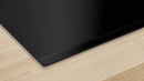 Bosch - Series 6 Induction hob with integrated ventilation system 70 cm surface mount without frame PVQ731H26E